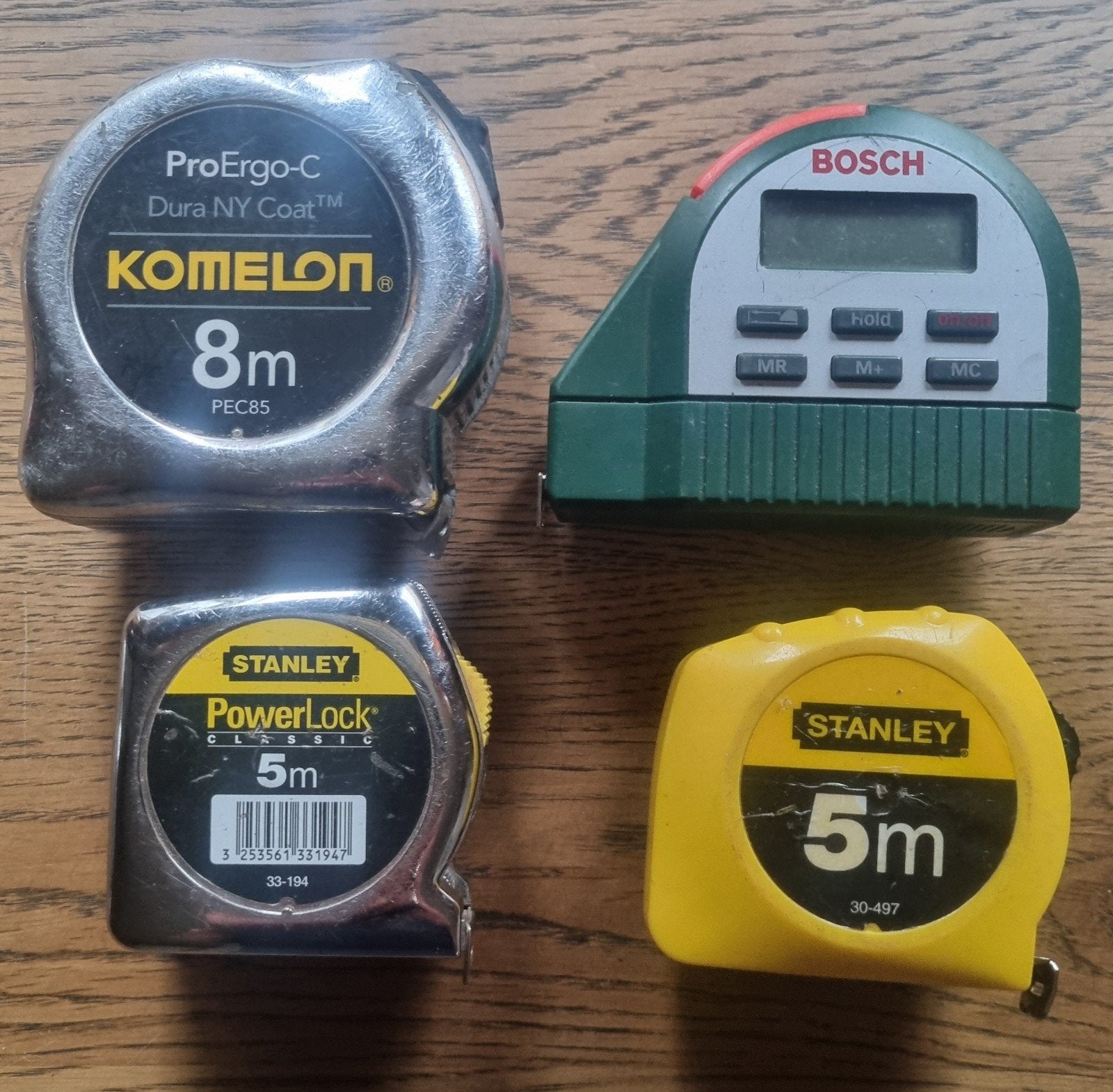 Set van 4 Rolmaten: Komelon, Bosch, Stanley (2x), Ophalen of Verzenden, Gebruikt, Afstand