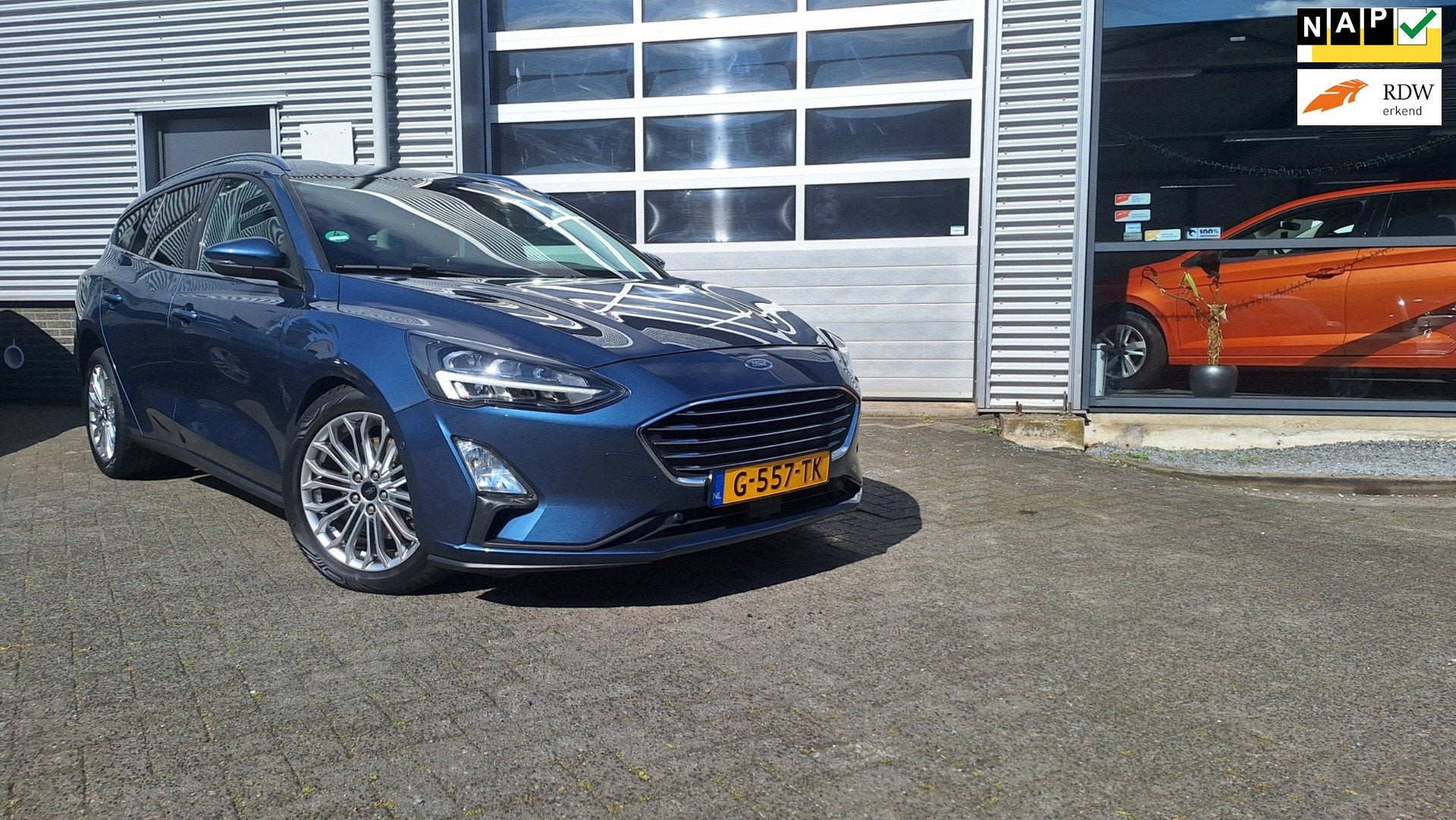 Ford Focus Wagon 1.5 EcoBoost Titanium Business Nav*Camera/C, Auto's, Gebruikt, Euro 6, Blauw, Origineel Nederlands