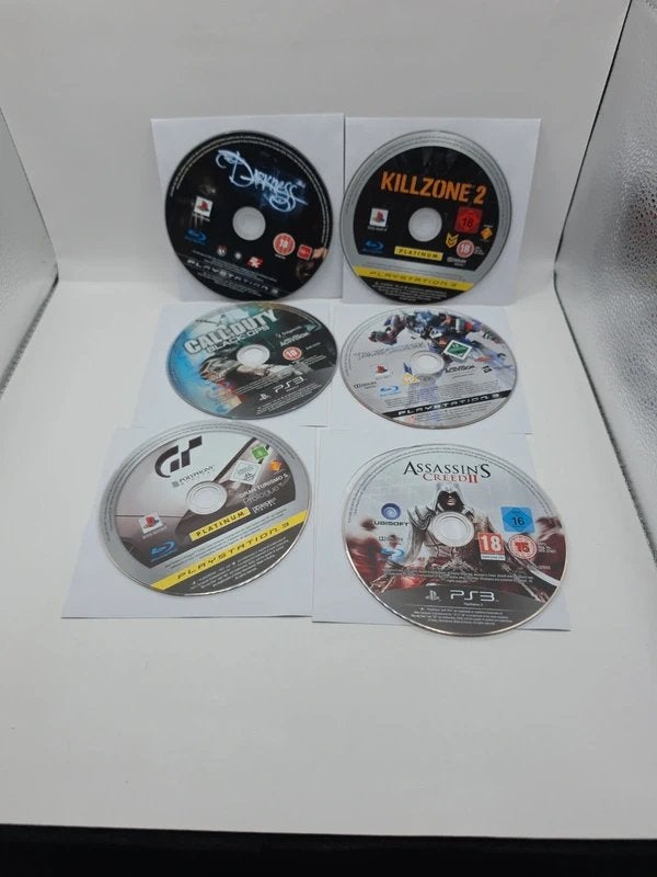 Lot of 6 Playstation 3 Discs PS3, Avontuur en Actie, Sony City 1-7-1 Konan, Minato-ku Tokyo 108-0075 Japan, support@playstation.com,