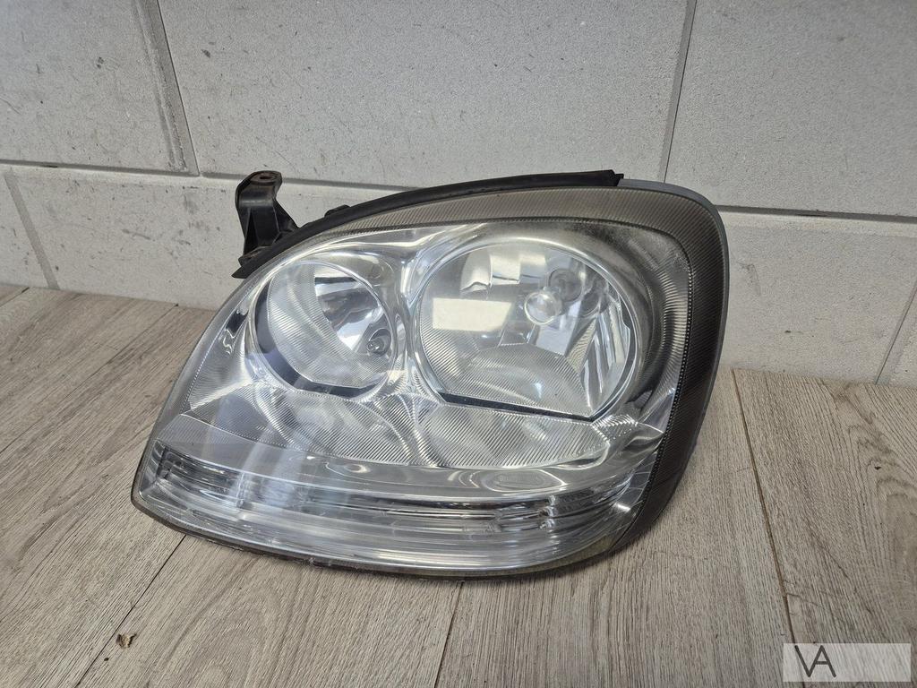 Koplamp links Nissan Almera Tino 2000 - 2007 witte knipper, Gebruikt, -, -, Ophalen of Verzenden