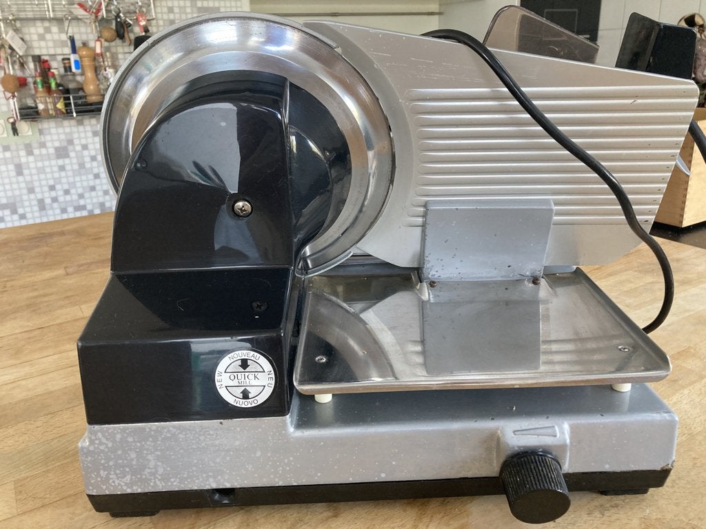 vleessnijmachine QUICK, Ophalen