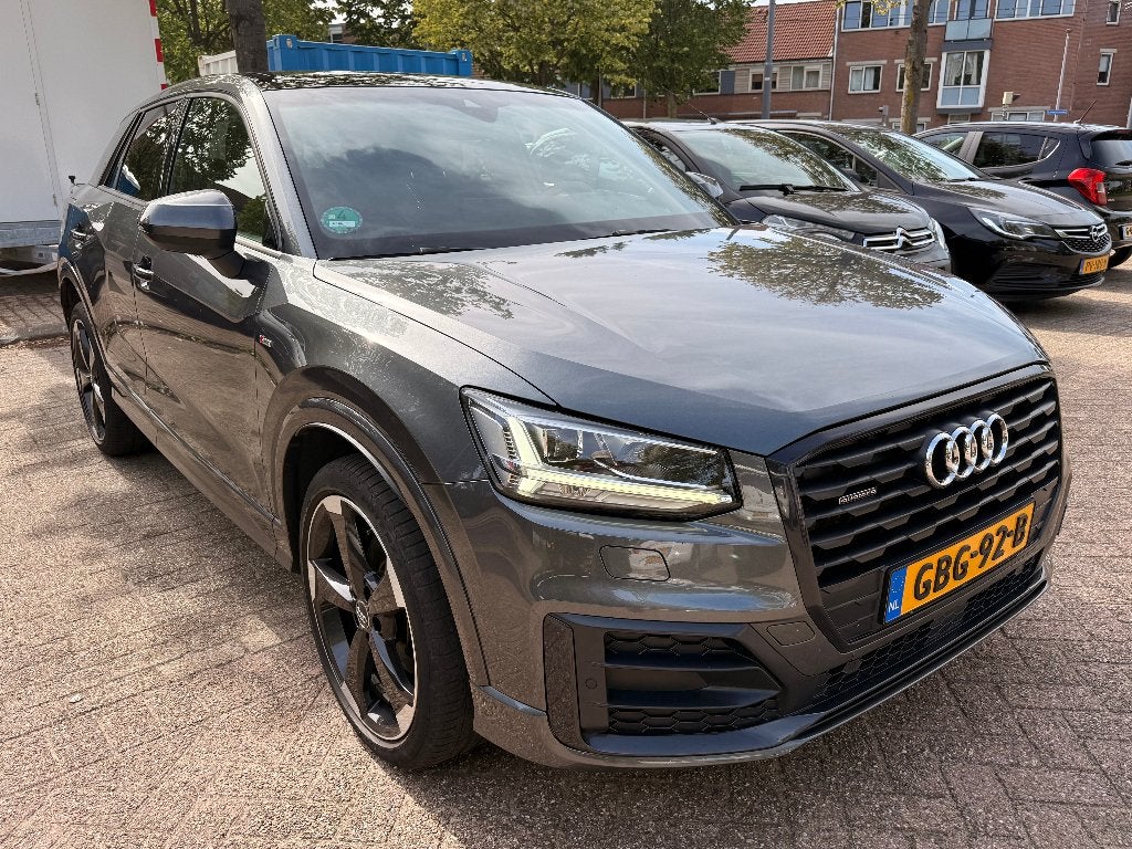Audi Q2 2.0 Tfsi 190pk S Tronic Quattro 2017 Grijs, Automaat, 1984 cc, Leder en Stof, Particulier