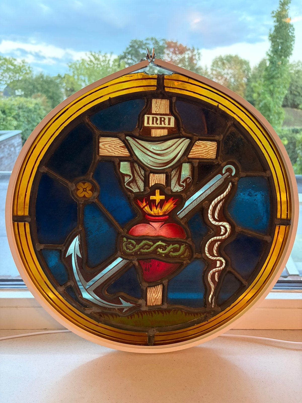 Hele oude glas in lood raam: Inri, Ophalen