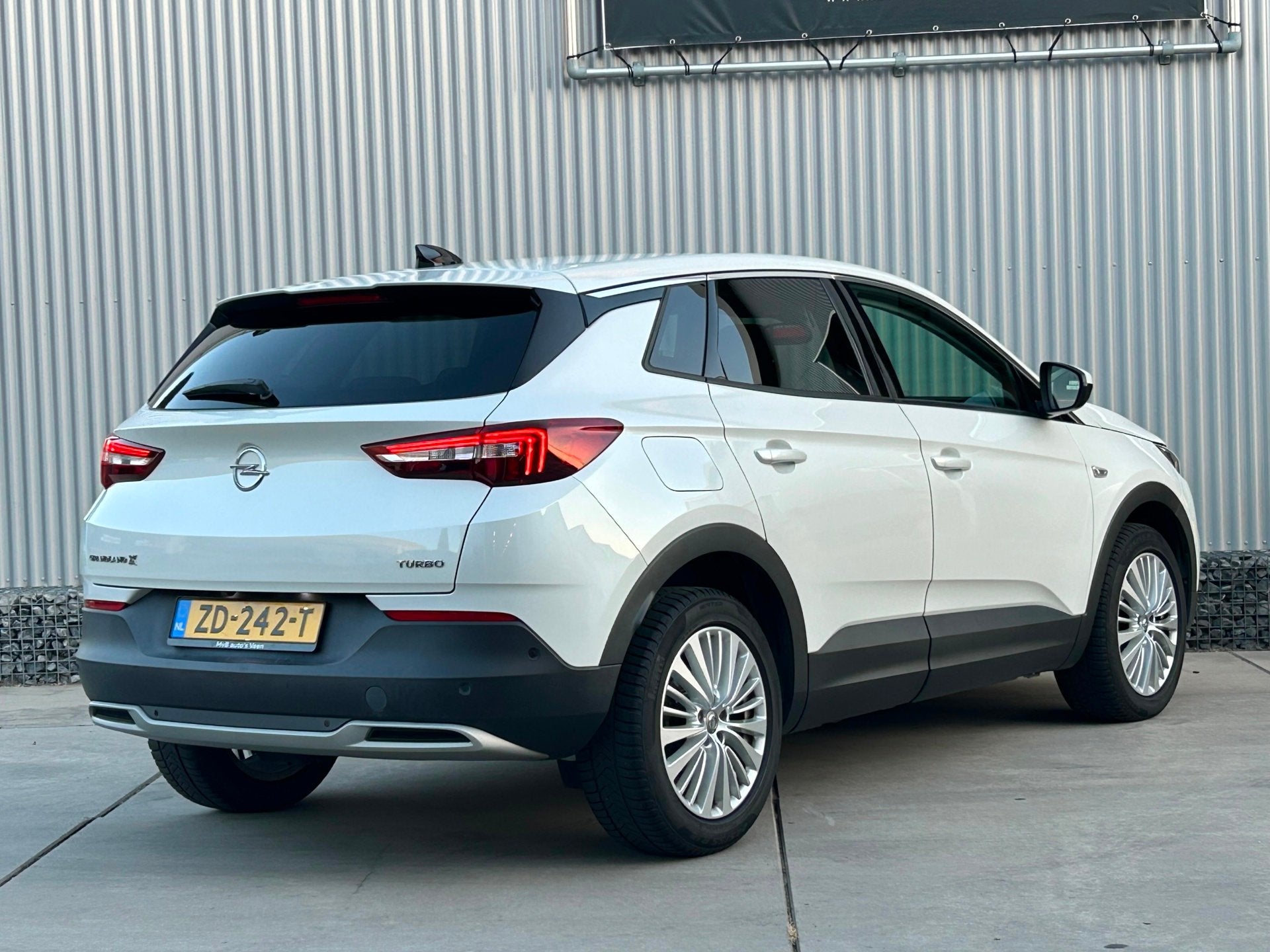 Opel Grandland X 1.2 Turbo Business Executive automaat, Navi, Auto's, Gebruikt, Euro 6, 1199 cc, Leder en Stof