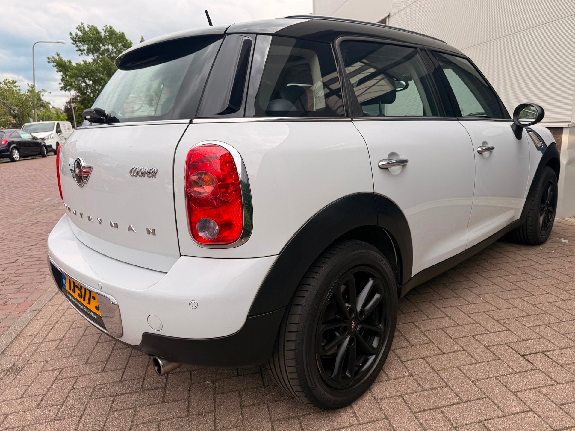 Mini Countryman 1.6 Cooper Chili/Pano/Leder/Navi/Stoel verwa, Auto's, Voorwielaandrijving, Gebruikt, Euro 6, Leder en Stof