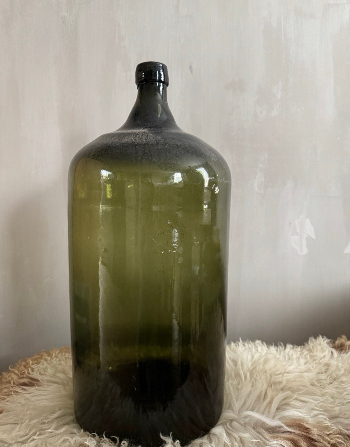Oude gistfles groen, Ophalen