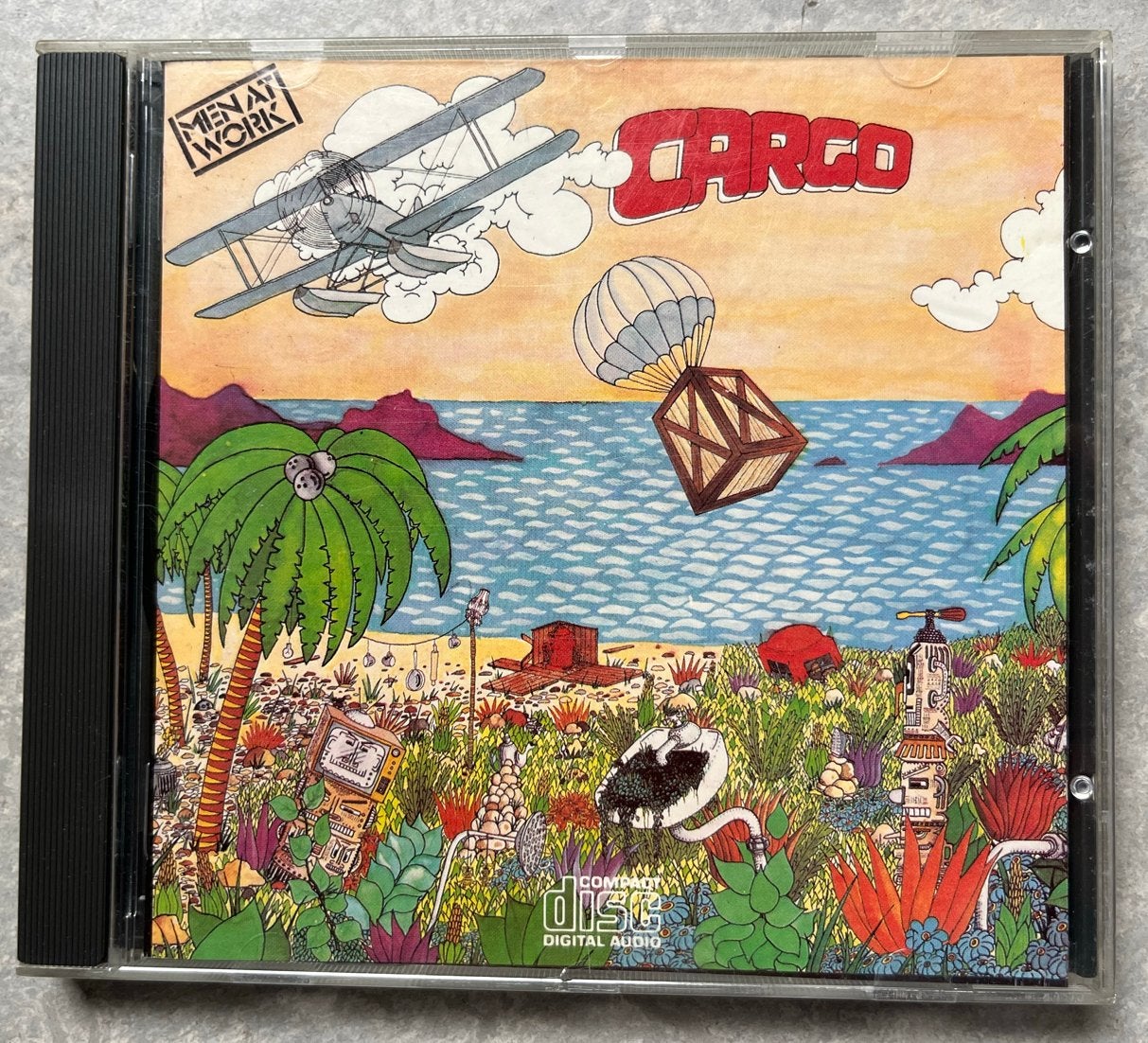 Men At Work - Cargo (CD poprock), Gebruikt, Ophalen of Verzenden, Inclusief boekje, Poprock