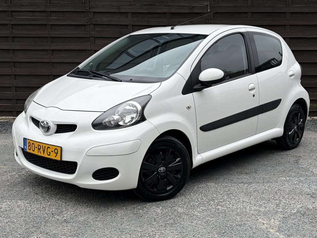 Toyota Aygo 1.0-12V Comfort Navigator / Airco / EL / NAP, Euro 5, Metallic lak, Gebruikt, 4 stoelen