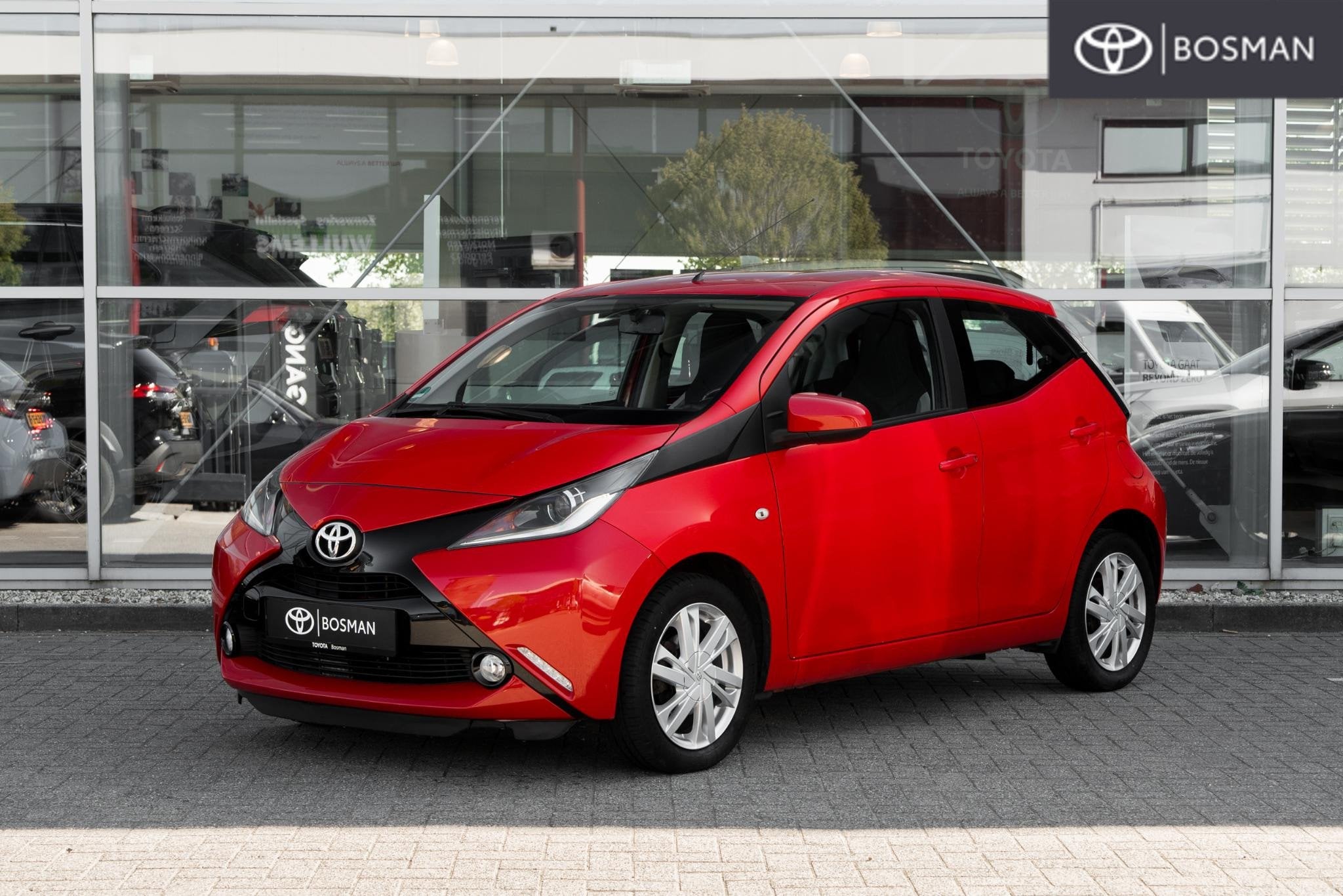 Toyota Aygo 1.0 VVT-i x-cite, Auto's, Stof, Gebruikt, Euro 6, 4 stoelen