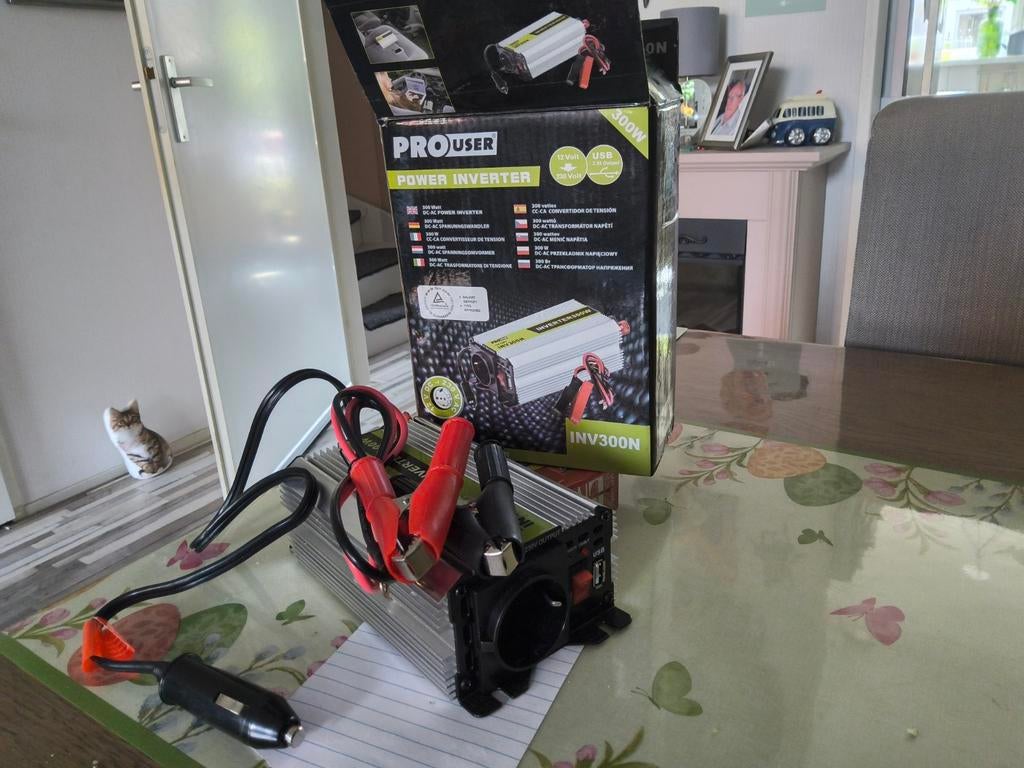 Power inverter 12v naar 220, Ophalen