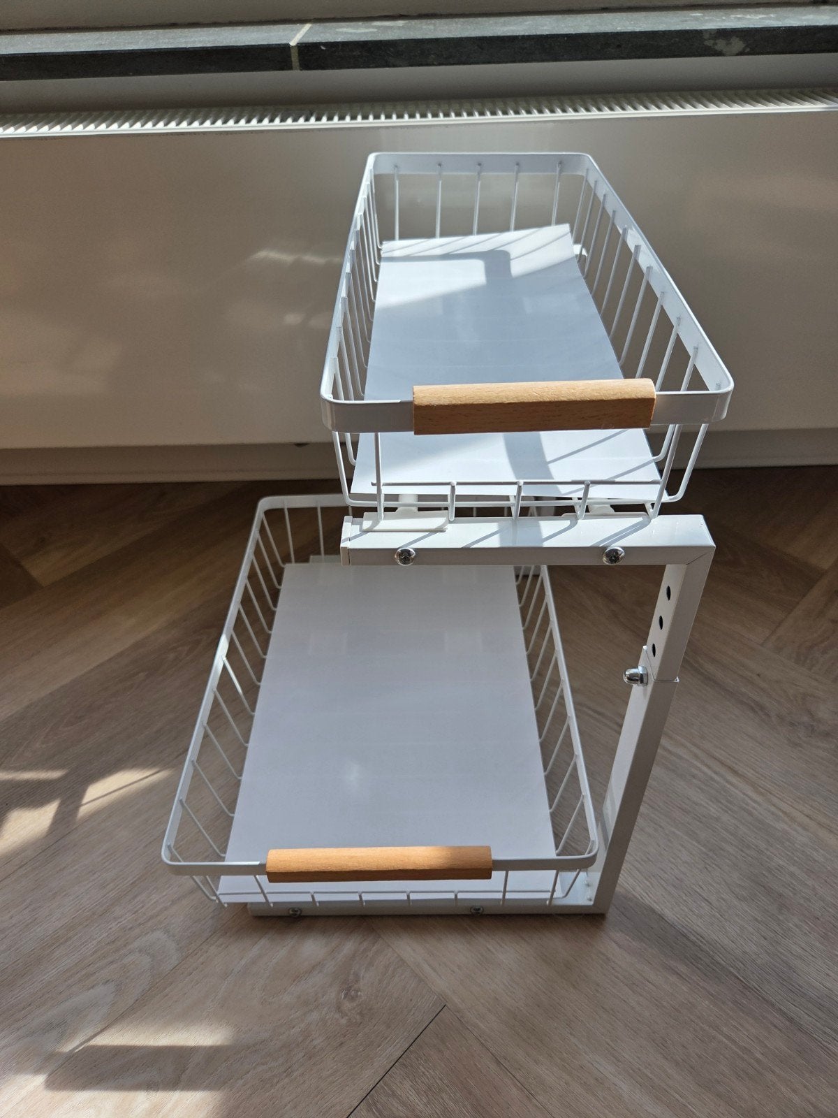 Under sink storage cabinet, Ophalen