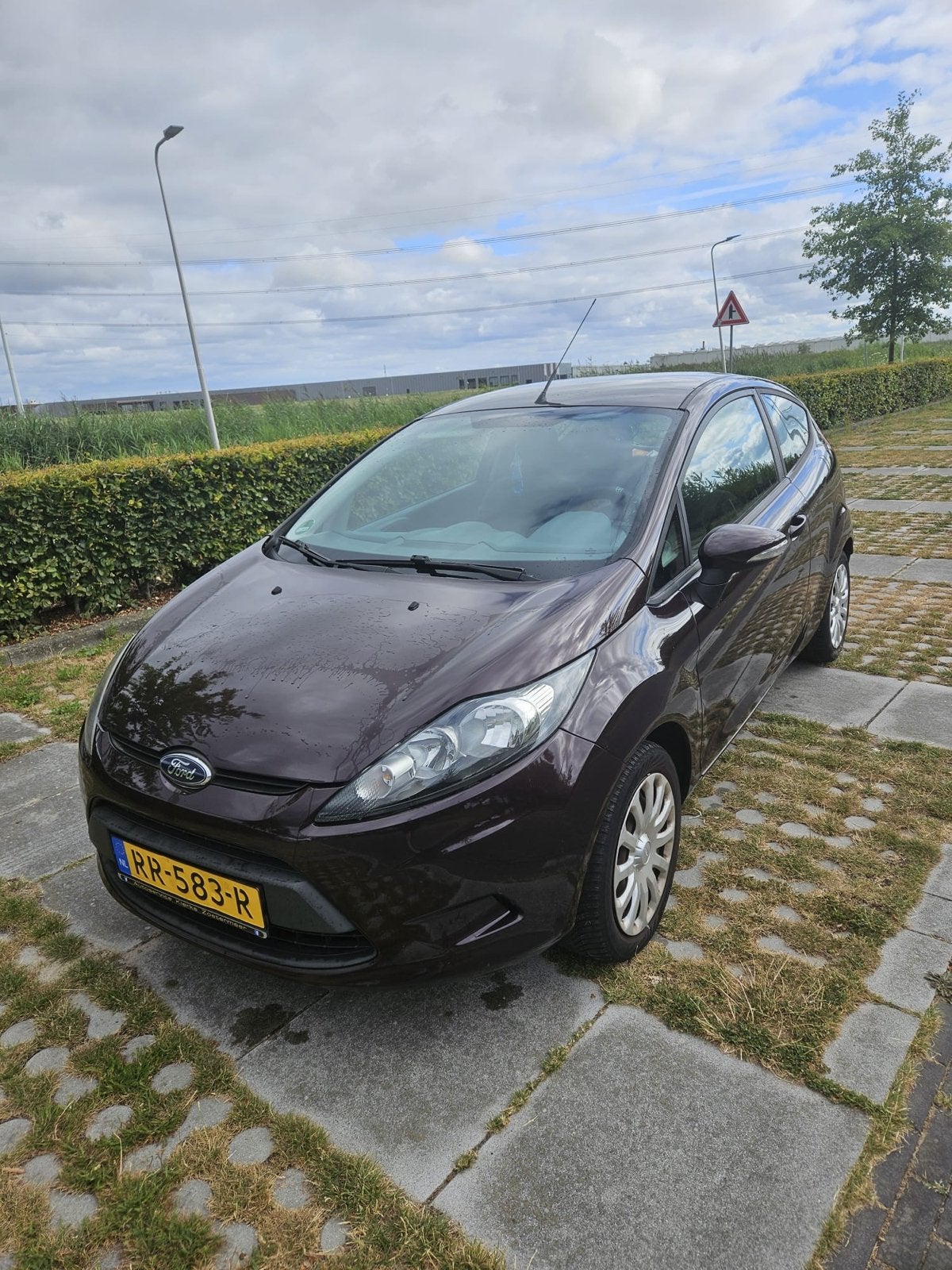 Ford Fiësta 1.25 60KW 3DR 2009 Rood - Airco, Auto's, Voorwielaandrijving, Stof, 600 kg, 4 cilinders