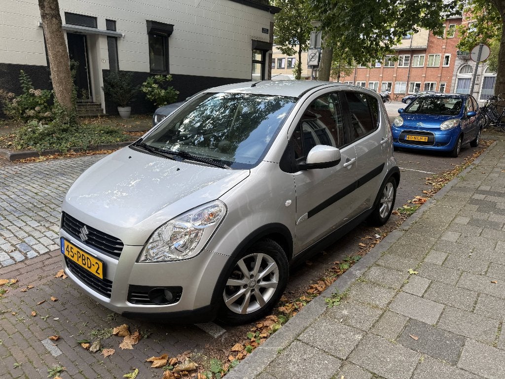 Suzuki Splash 1.2 Exclusive | Automaat | Nieuwe Banden & APK, Auto's, Stof, Stoelverwarming, 4 cilinders, Particulier