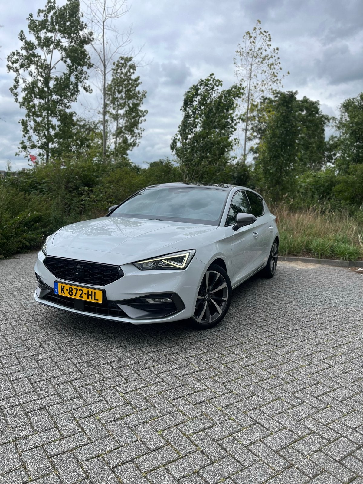 Seat Leon 1.5 Etsi 150pk Dsg-7 2021 Wit, Auto's, Lichtsensor, 1498 cc, 680 kg, 4 cilinders