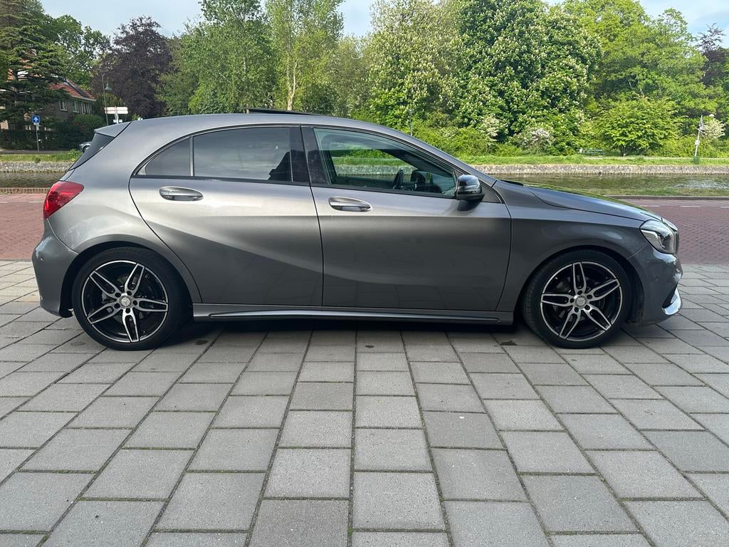 Mercedes-Benz A-Klasse A180 1.6 Amg-Line Aut7 2017 Grijs, Auto's, 4 cilinders, 122 pk, 1200 kg, 19 km/l