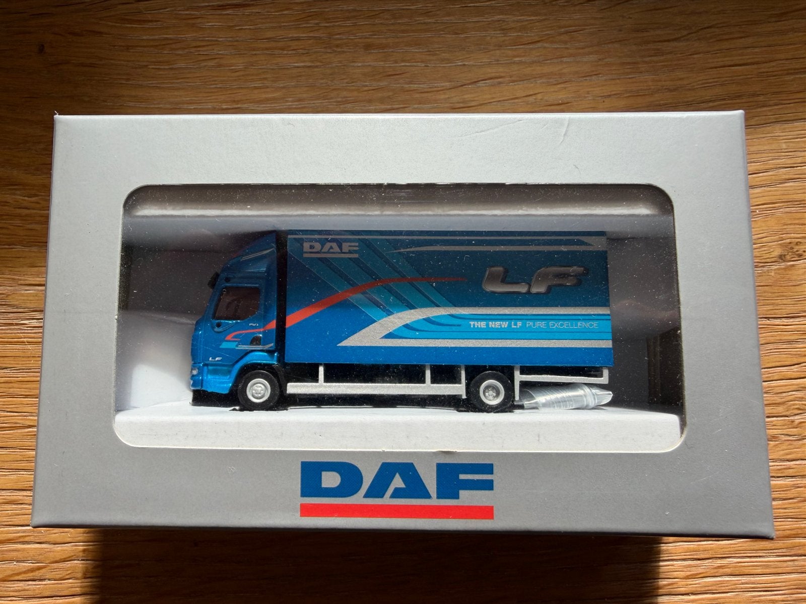WSI / Tema Toys – DAF LF MY2017 Box Truck 4x2 metallic blauw, Ophalen of Verzenden, Nieuw, Bus of Vrachtwagen, Overige merken