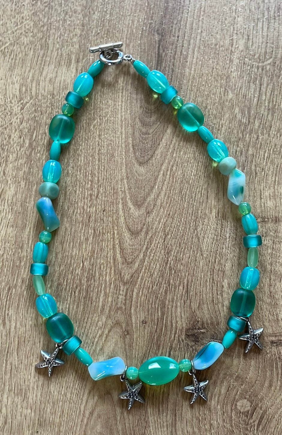 Prachtige turquoise ketting glaskralen zeester bedels, Verzenden, Zo goed als nieuw, Blauw, Overige materialen