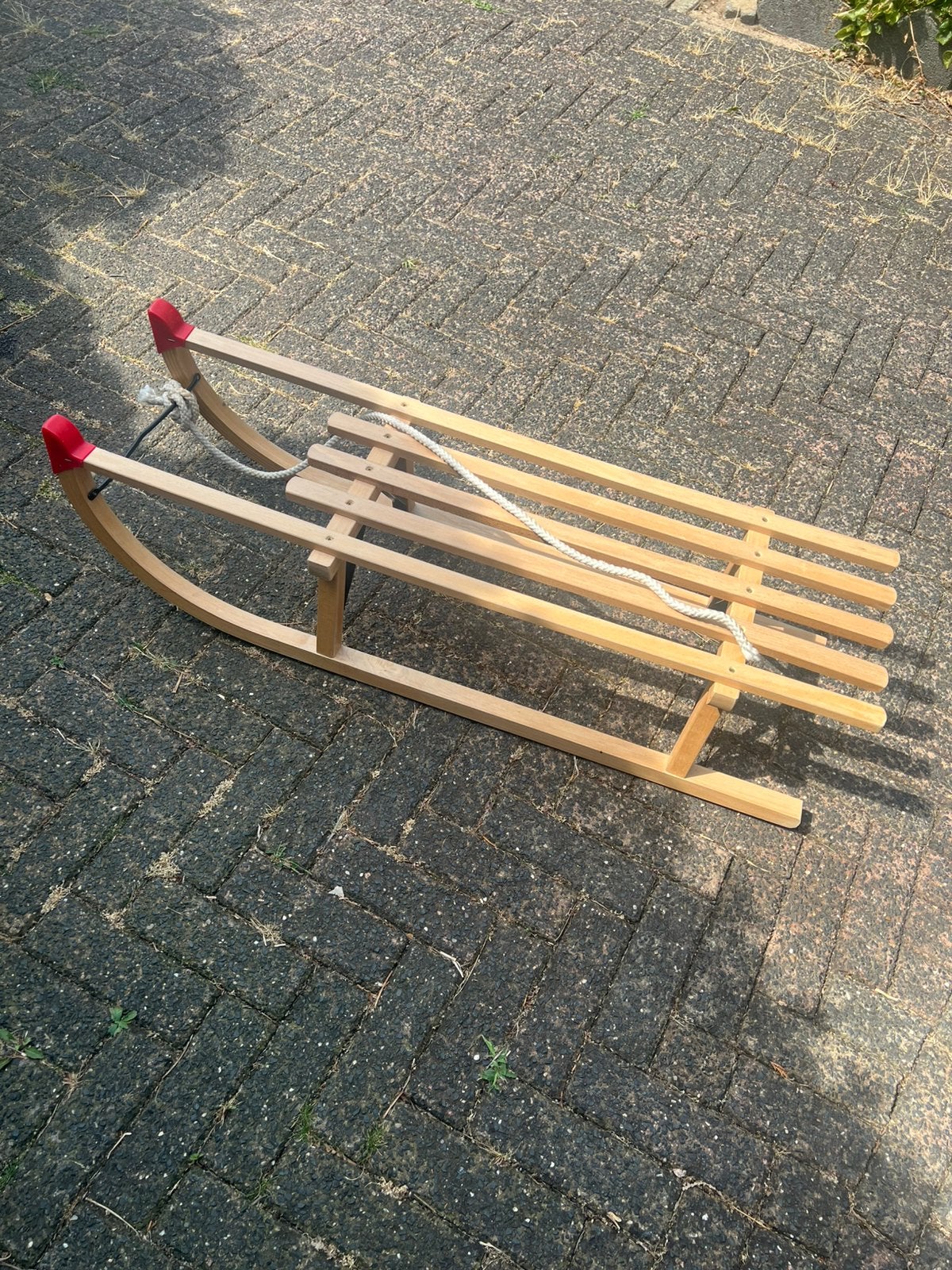 Houten slee, Ophalen, Zo goed als nieuw
