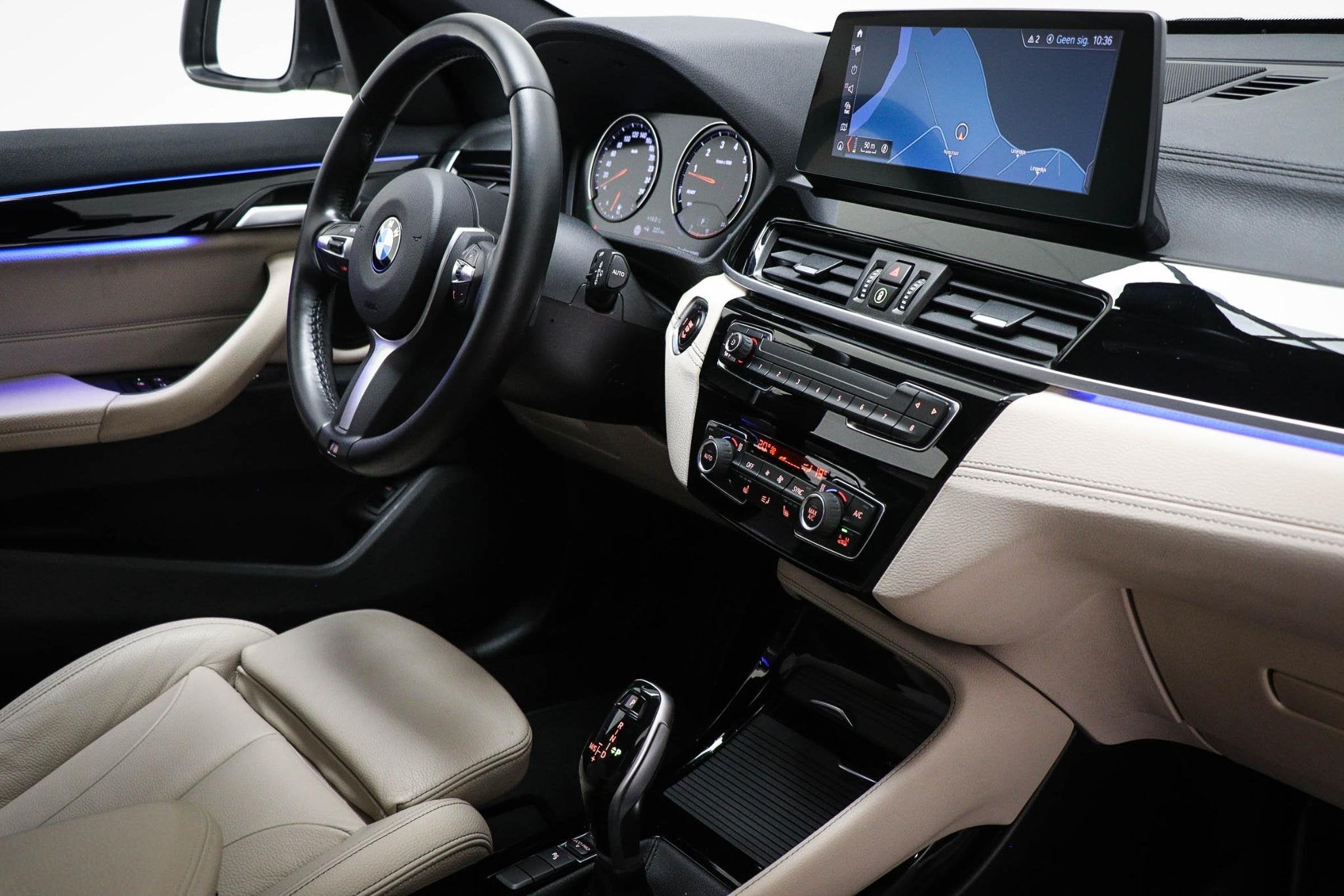 BMW X1 sDrive20i VDL Nedcar Edition | AUDIO MEDIA / PARKING, 1998 cc, Met garantie (alle), Wit, Bedrijf