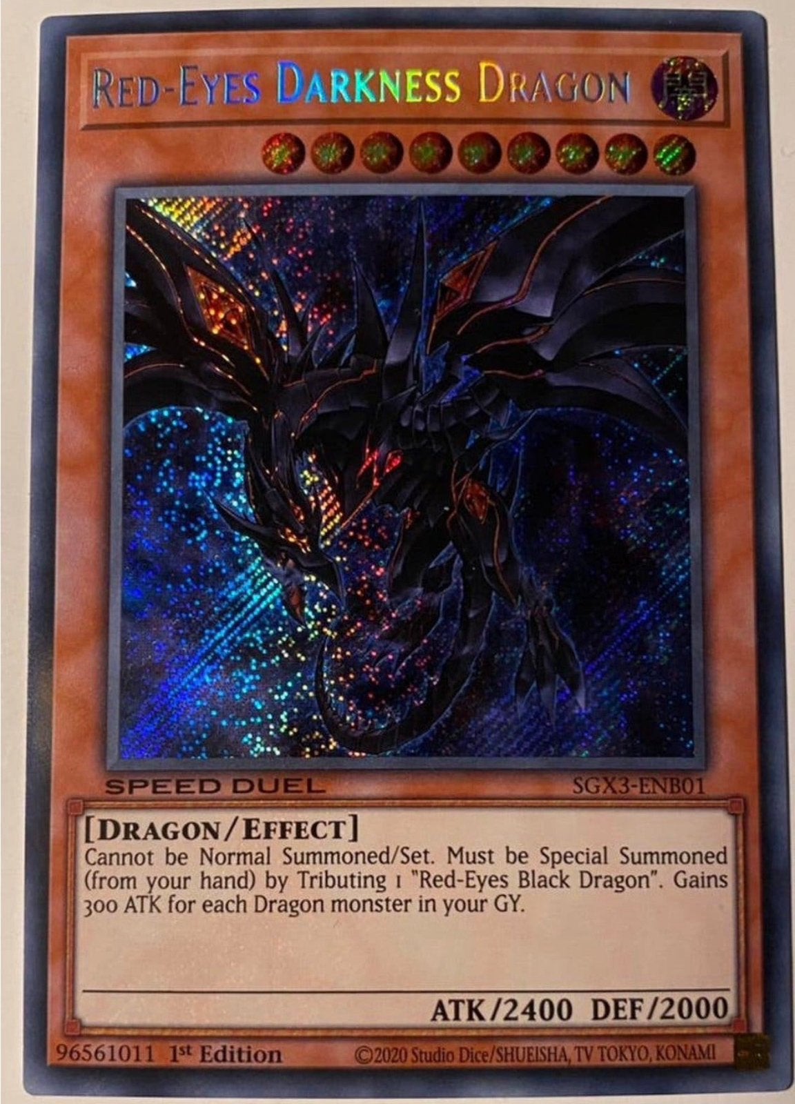 Yu-Gi-Oh! Red-Eyes Darkness Dragon SGX3 1st Edition !, Ophalen of Verzenden, Zo goed als nieuw, Losse kaart, Foil
