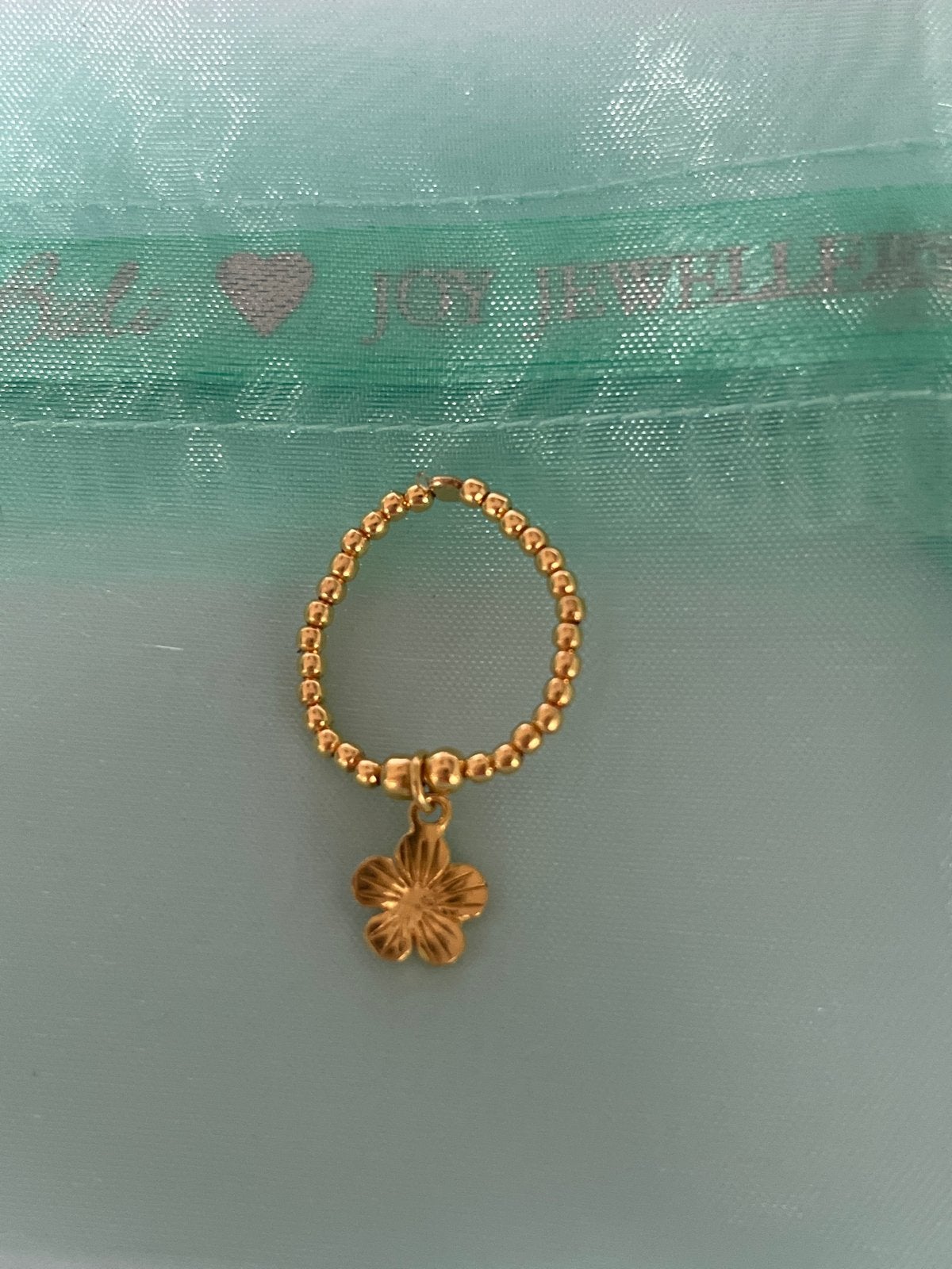 Joy jewellery bali Gouden ring met bloem bedel, Nieuw, Ophalen of Verzenden, 17 tot 18, Dame