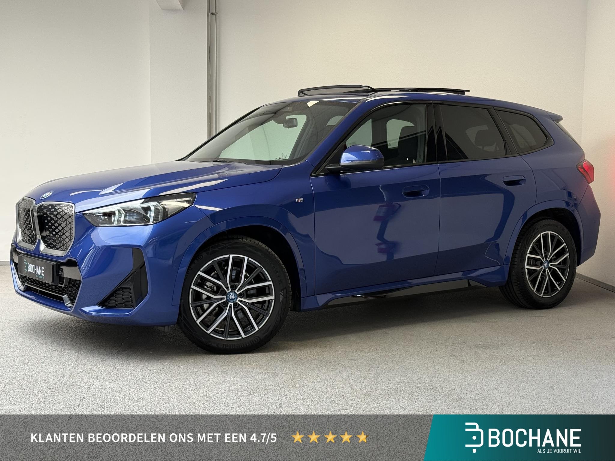 BMW iX1 eDrive20 67 kWh M-Sport | SOH 98% | PANO | CAMERA |, Auto's, 514 km, Gebruikt, Blauw, Automatische klimaatregeling
