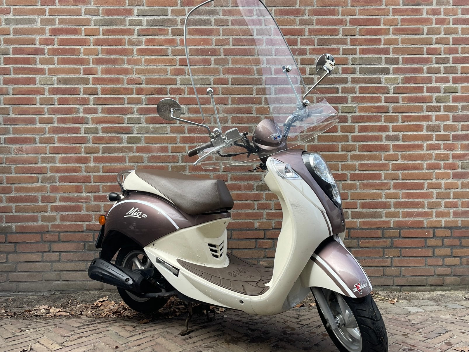 SYM MIO 2011 (snorfiets) Goede staat / Garantie!, Mio, Zo goed als nieuw, Benzine, Maximaal 25 km/u