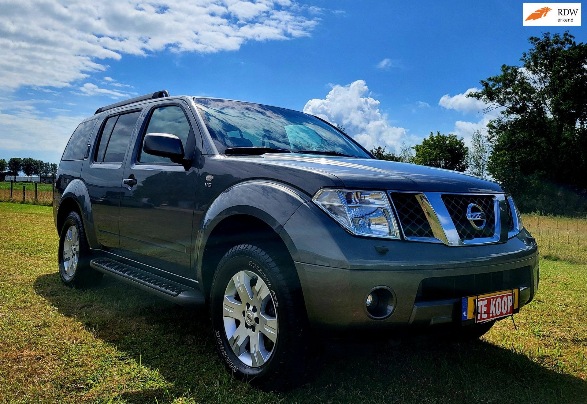 Nissan Pathfinder 4.0 V6 LE Premium IT, Auto's, Automaat, Gebruikt, 3000 kg, Leder
