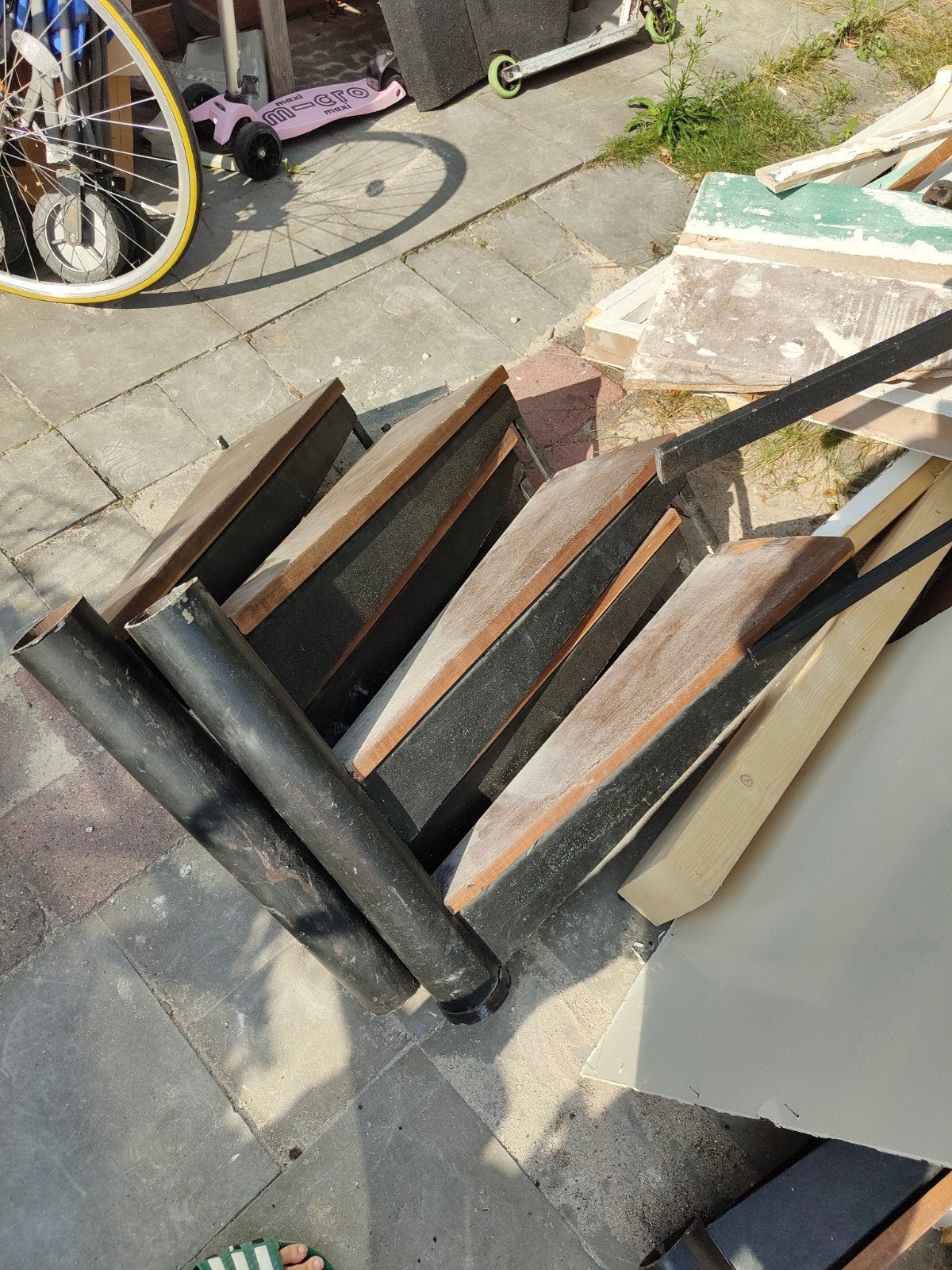 stalen wentel trap in stukken, Ophalen