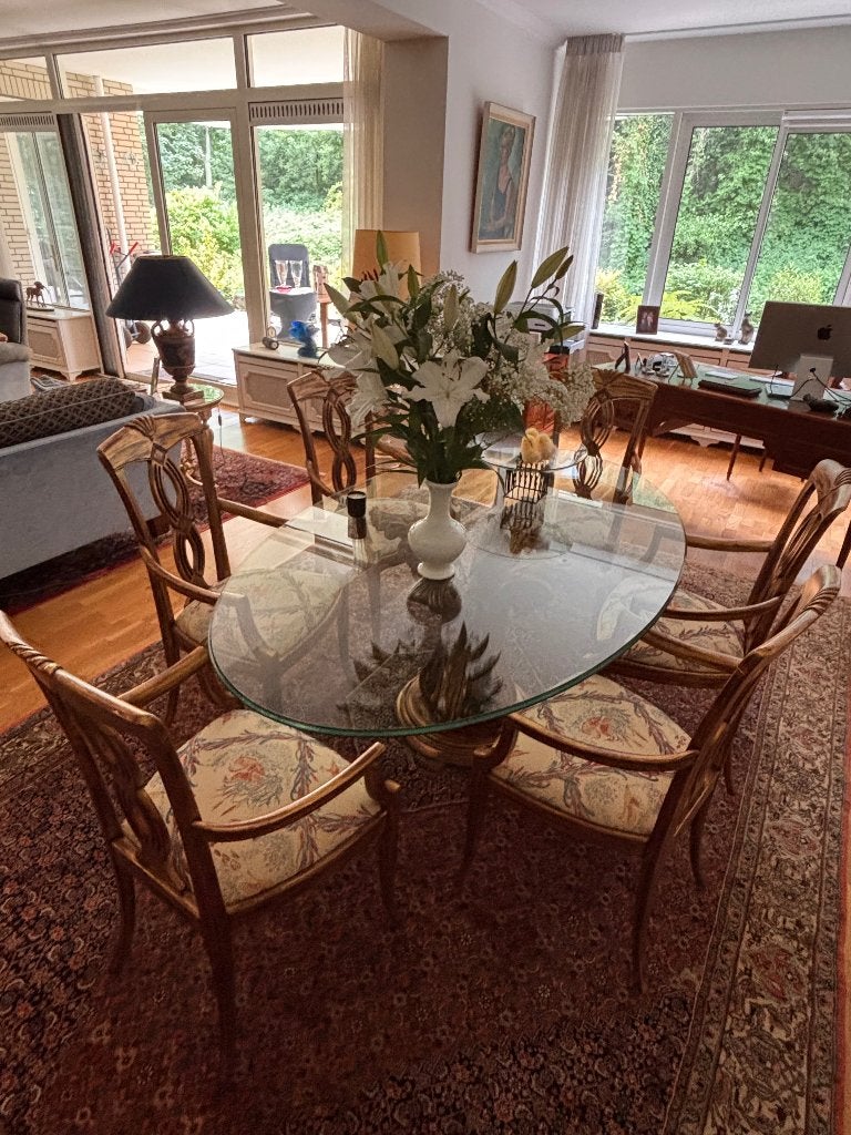 Exclusieve ovale glazen design tafel met 6 armstoelen, Ophalen, 100 tot 150 cm, Design, Zo goed als nieuw