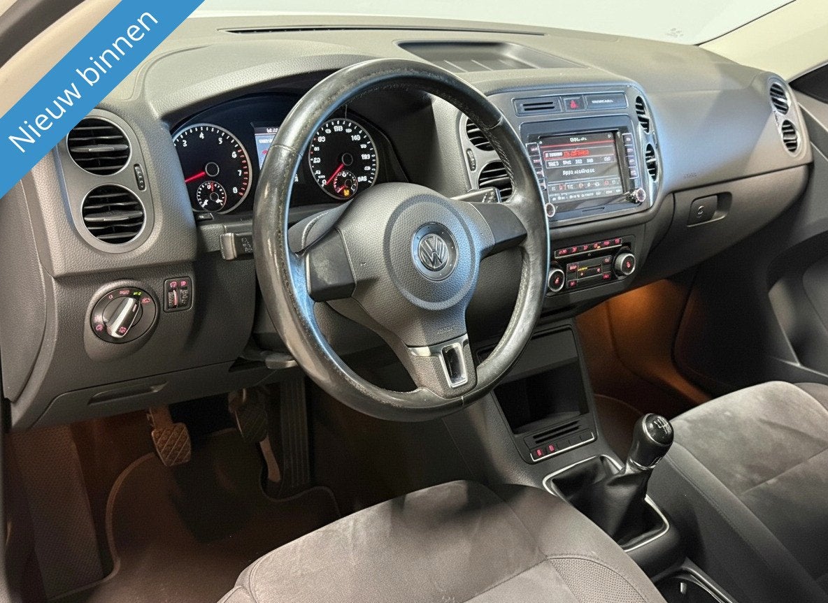 Volkswagen Tiguan 1.4 TSI 150PK Sport&Style Carplay|Trekhaak, Voorwielaandrijving, Euro 5, 15 km/l, Zwart