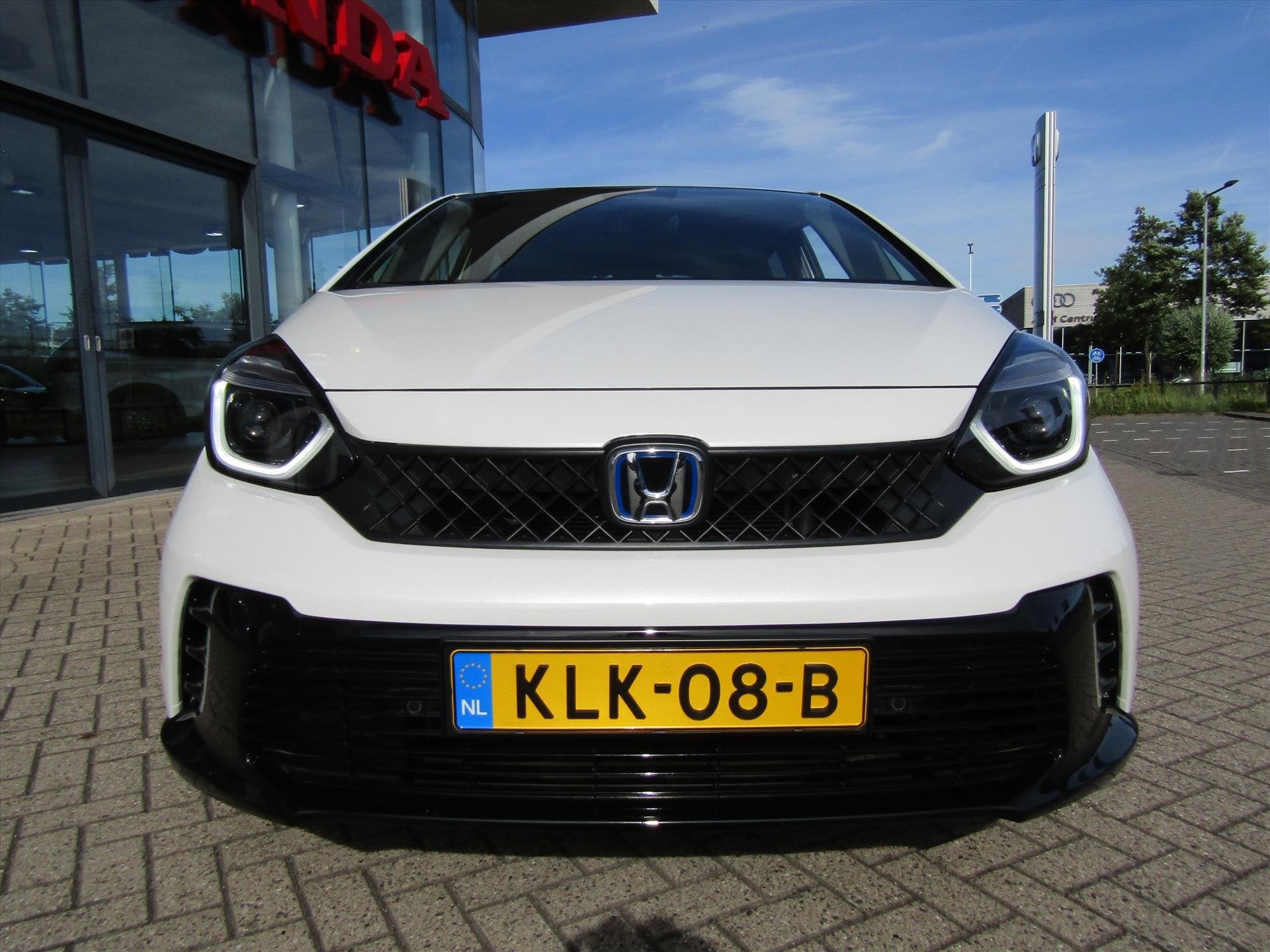 Honda Jazz 1.5 i-MMD 122pk Hybrid CVT Advance Sport, Trekhaa, 4 cilinders, Leder en Stof, Wit, Bedrijf