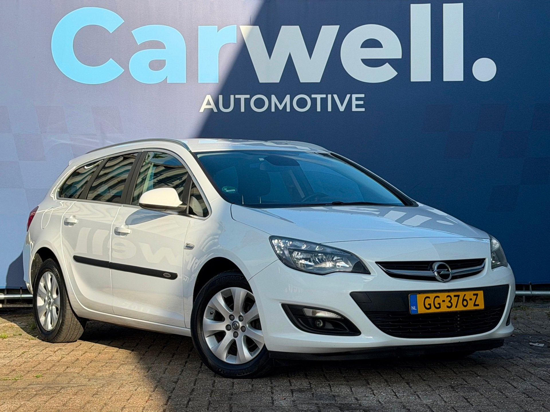 Opel Astra Sports Tourer 1.4 Turbo Blitz|2e Eigenaar|Airco|N, Auto's, Stof, Gebruikt, 4 cilinders, Wit