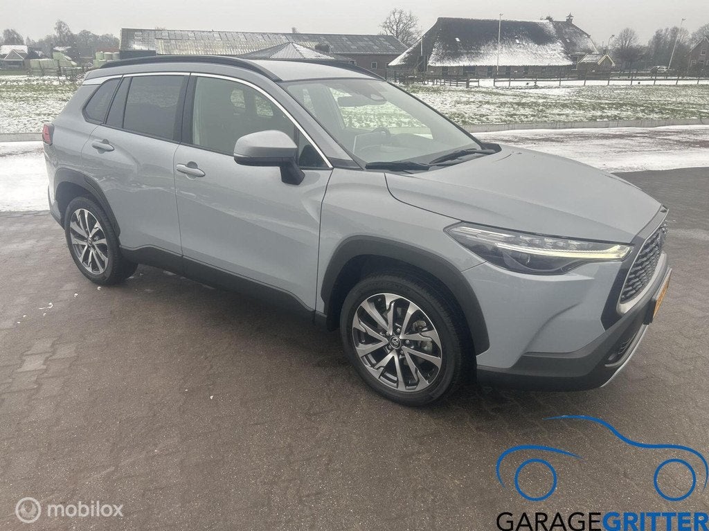 Toyota Corolla Cross Hybrid 140 Dynamic, Auto's, Gebruikt, 4 cilinders, Hybride Elektrisch/Benzine, Te koop