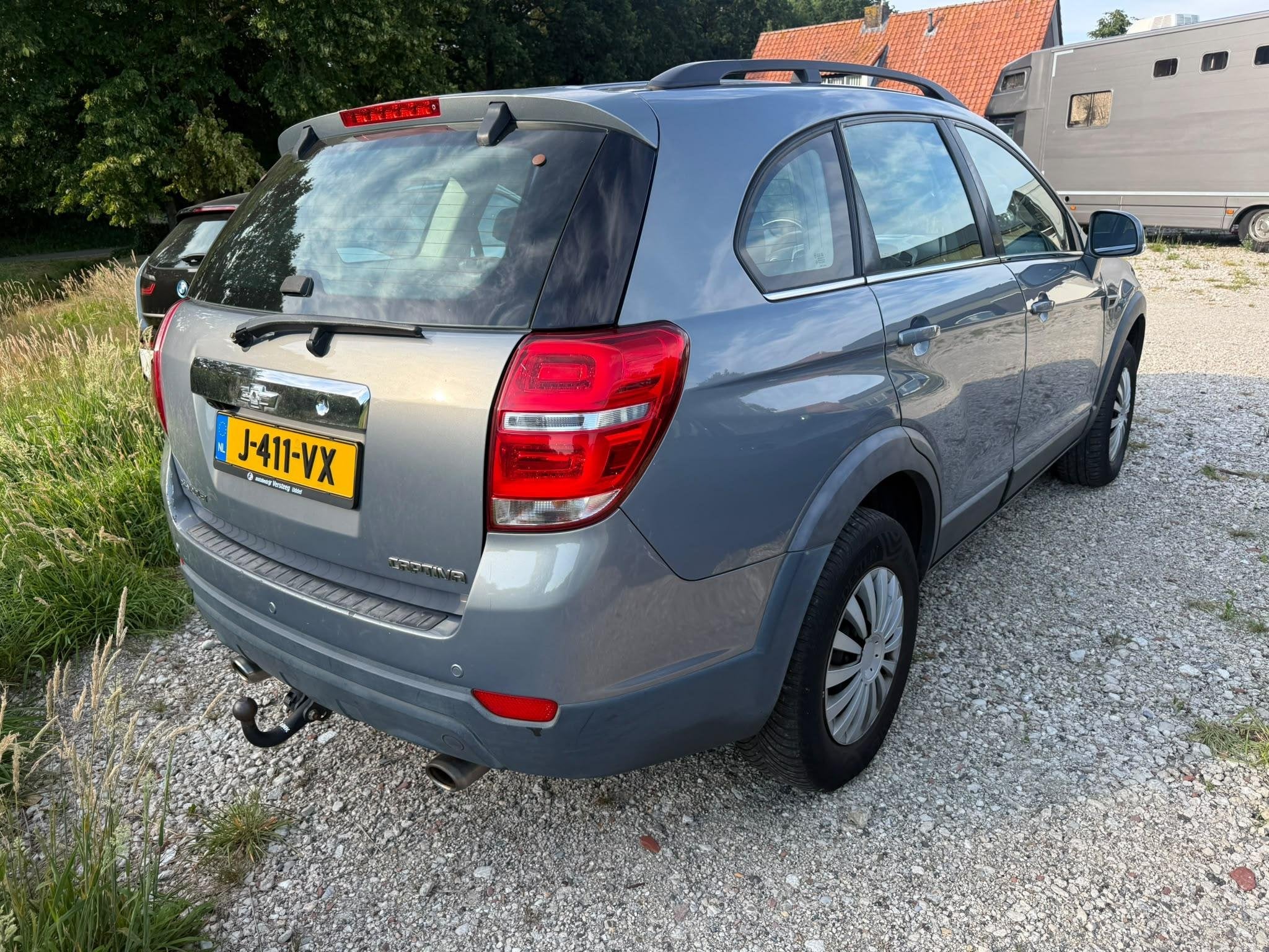 Chevrolet Captiva 2.4i LT 2WD 7 pers, Voorwielaandrijving, Euro 5, Gebruikt, Zwart