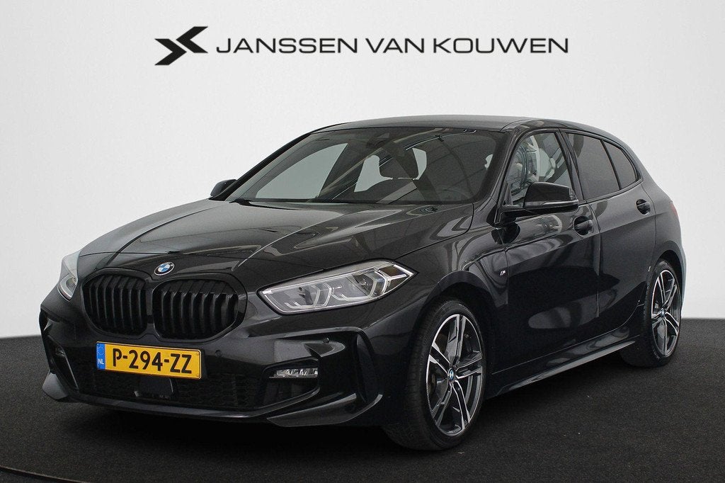 BMW 1-serie 120i Business Edition Automaat M Sport Stoelverw, Auto's, BMW, Gebruikt, 4 cilinders, Zwart, 178 pk