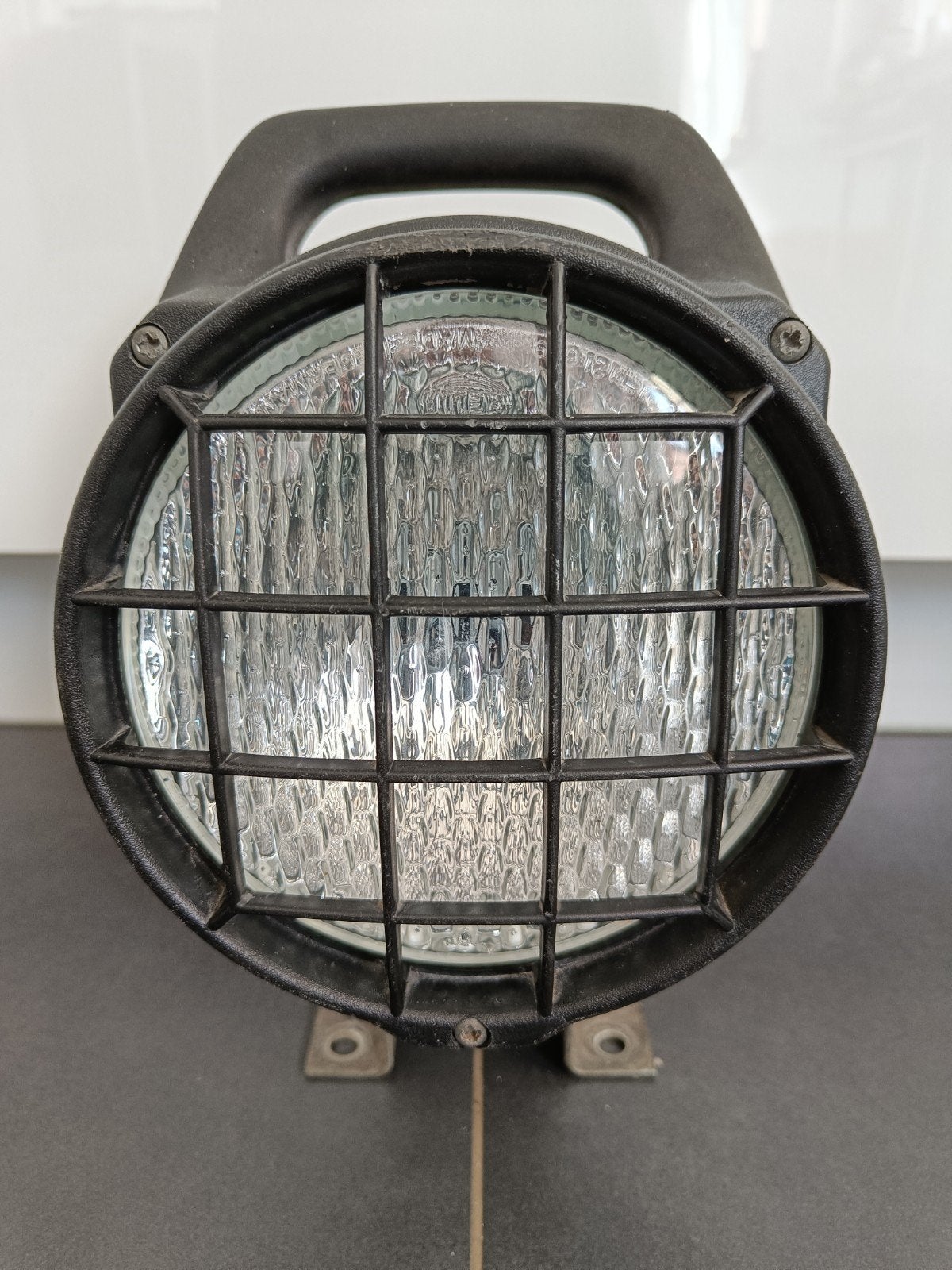 Hella werklamp met rooster., Auto-onderdelen, Ophalen of Verzenden, Gebruikt, Universele onderdelen