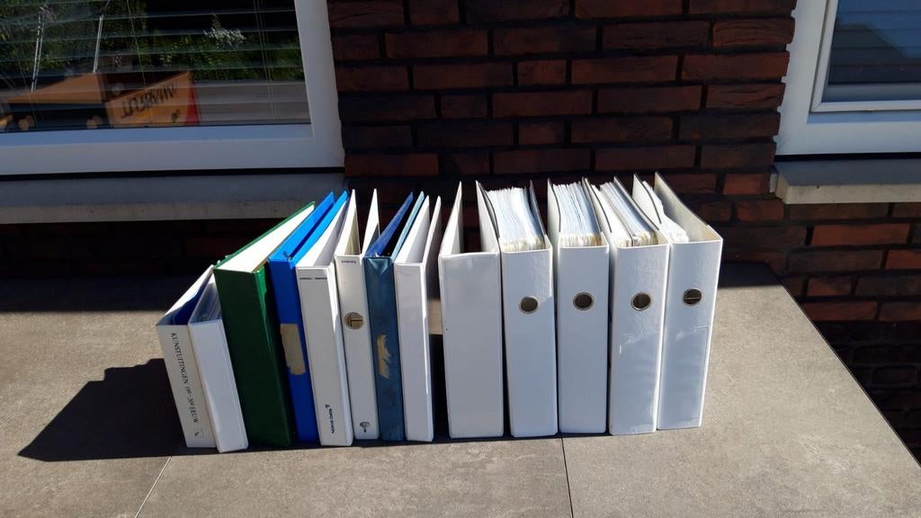 Veel gratis ringmappen met plastic mapjes erin, Ophalen, Gebruikt