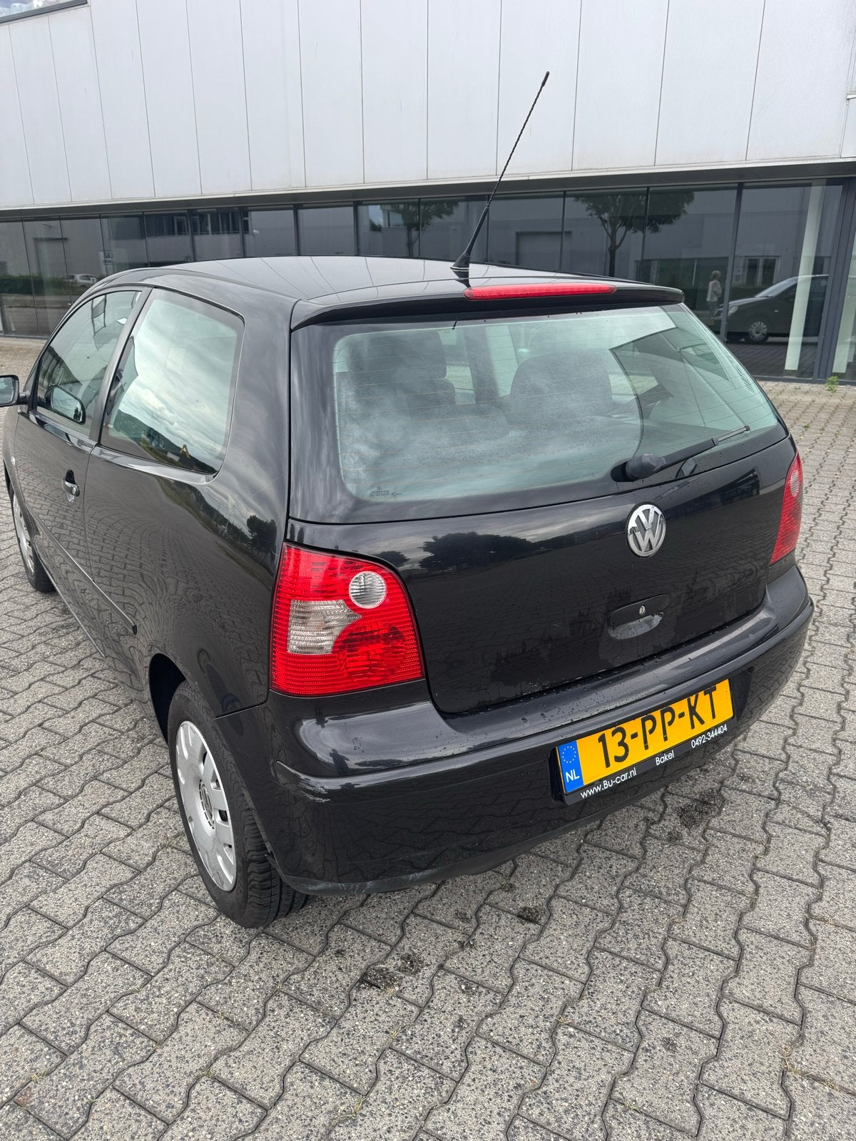 Volkswagen Polo 1.4 55KW 2004 Zwart, Auto's, Voorwielaandrijving, Stof, 4 cilinders, Zwart