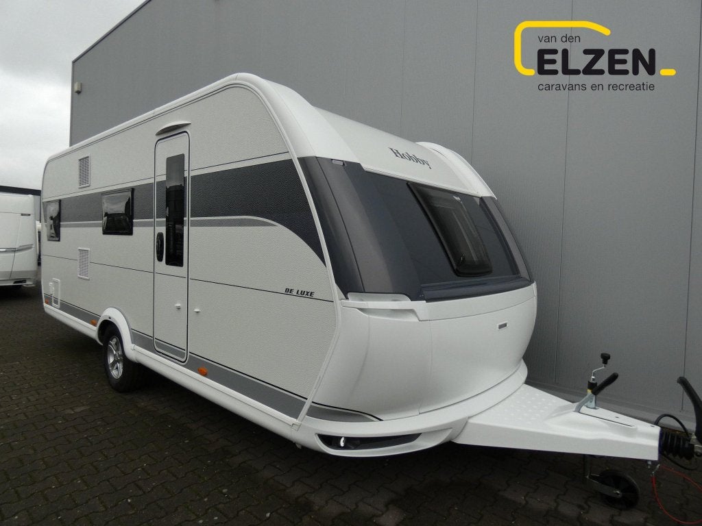 Hobby De Luxe 545 KMF White Edition Actiepakket, Caravans en Kamperen, Caravans, Hobby, Bedrijf, Treinzit, Overige typen