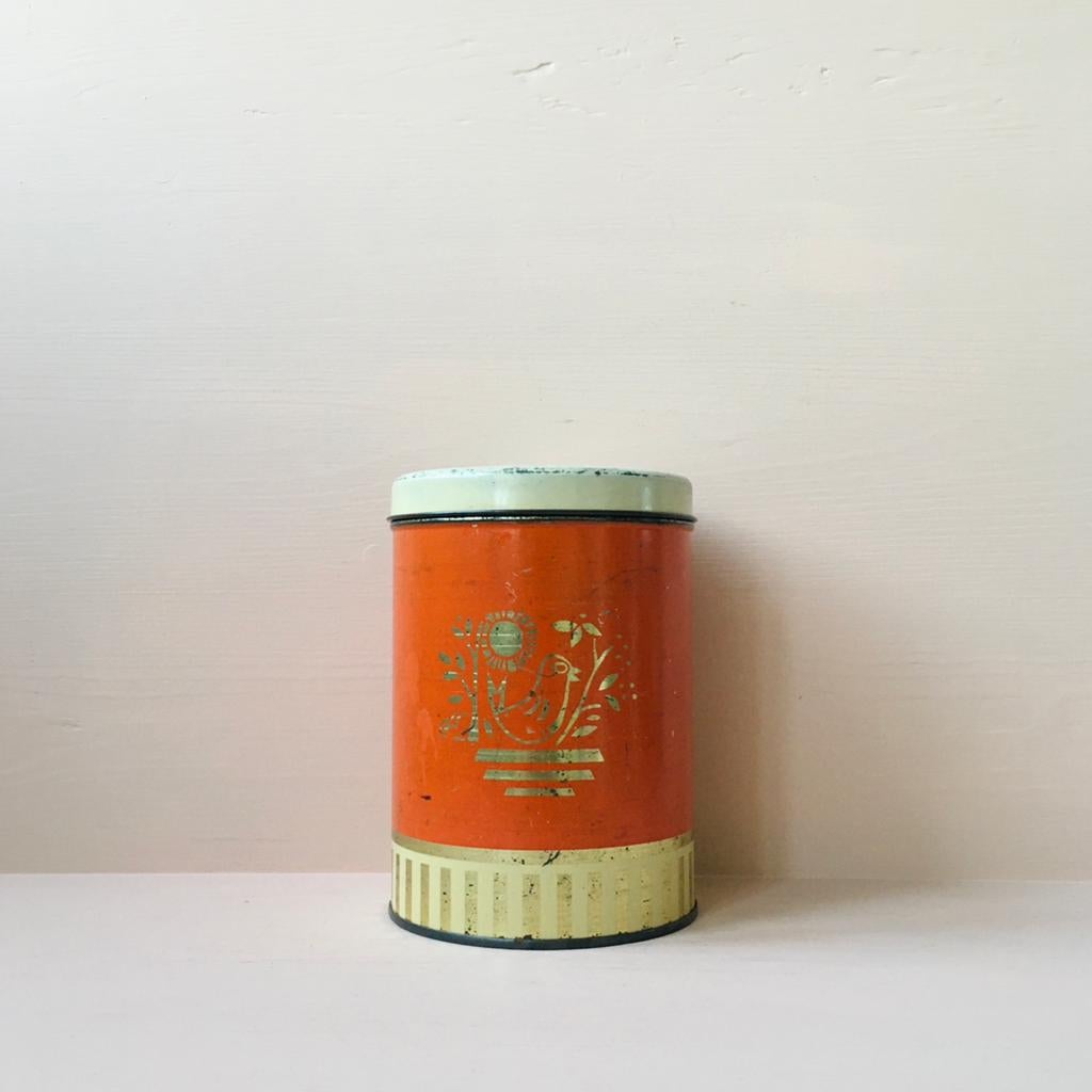 Oud oranje blik met goudkleurige vogel + crème deksel, Ophalen of Verzenden, Zo goed als nieuw, Overige