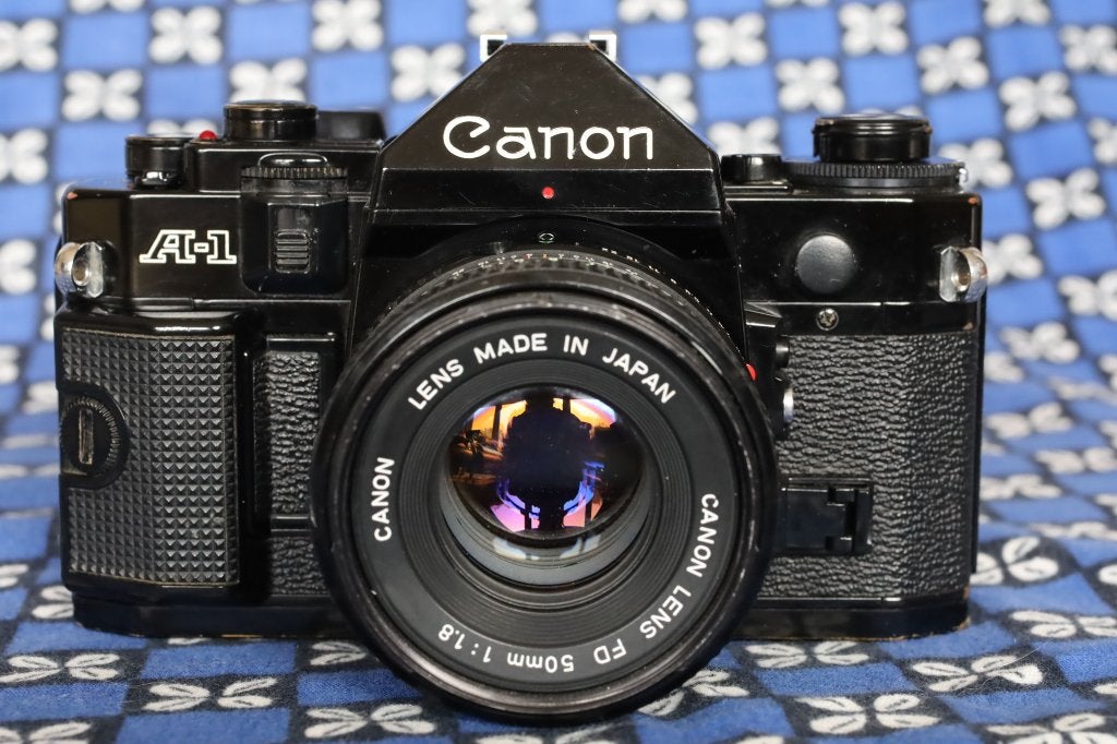 Canon A-1 izgst + service + nieuwe seals: werkt 100%, Audio, Tv en Foto, Fotocamera's Analoog, Ophalen of Verzenden, Refurbished