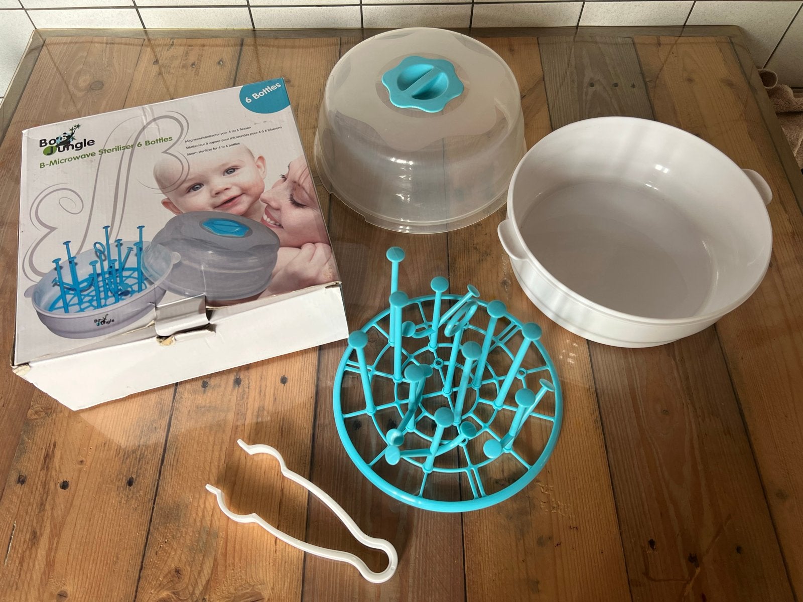 Bo Jungle Magnetron Sterilisator voor 6 Flessen, Ophalen of Verzenden, Zo goed als nieuw