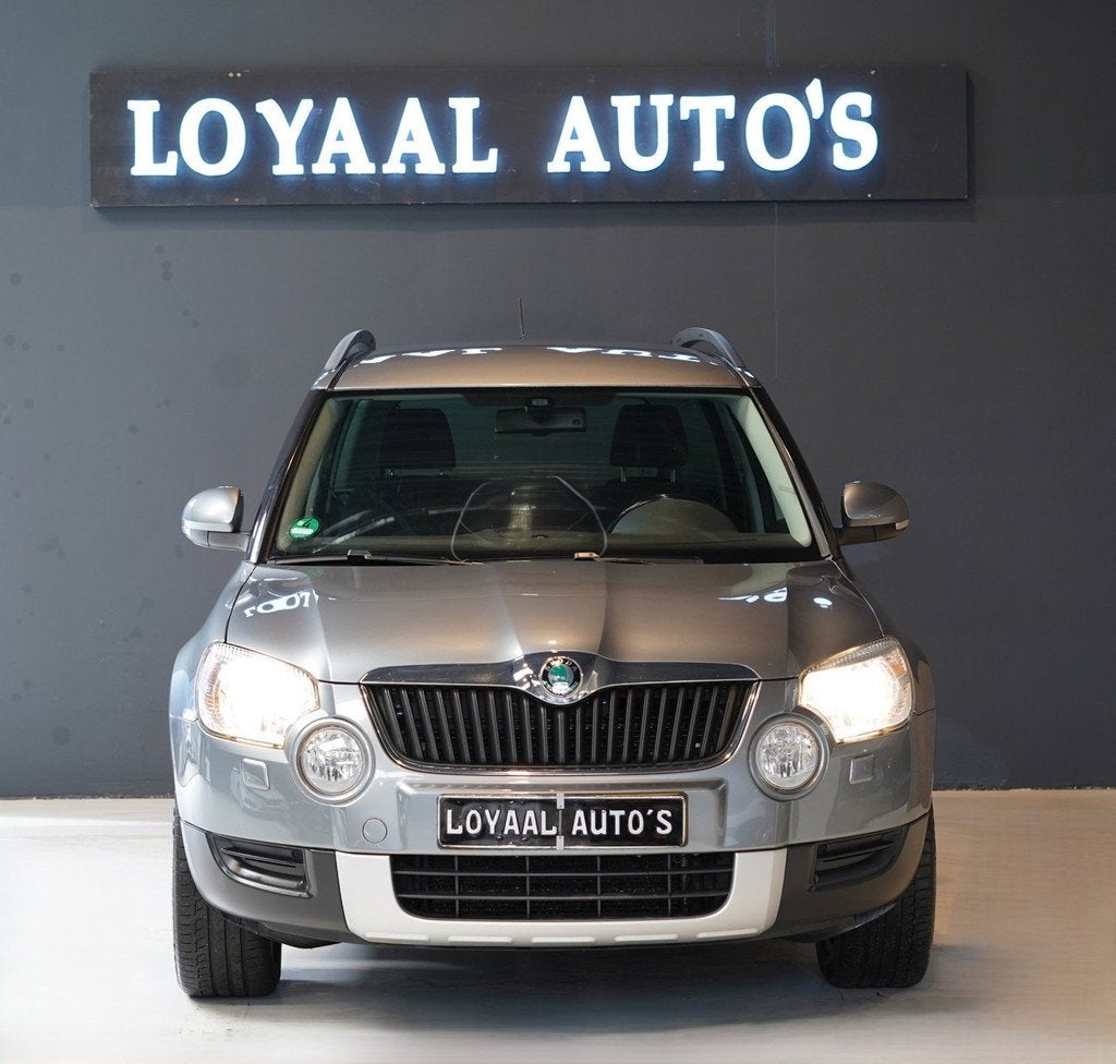 Skoda Yeti 1.2 TSI Tour | NAVI | AIRCO | CRUISE | PDC | TREK, Auto's, Skoda, Voorwielaandrijving, Euro 5, Parkeersensor, Gebruikt