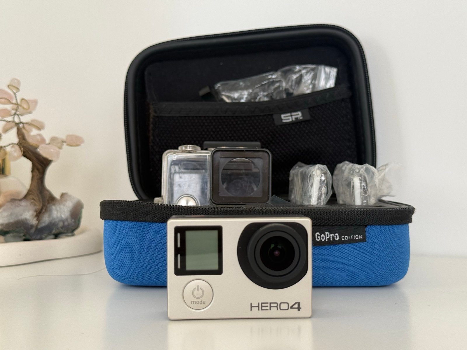 GoPro Hero 4 met accessoires en beschermhoes, Ophalen of Verzenden, Zo goed als nieuw, GoPro