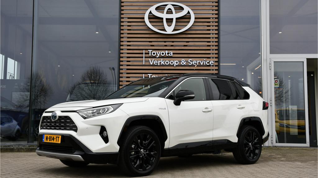 Toyota RAV4 2.5 Hybrid Bi-Tone Automaat 218pk | Rondomzicht, 12 maanden, Gebruikt, 4 cilinders, Leder en Stof