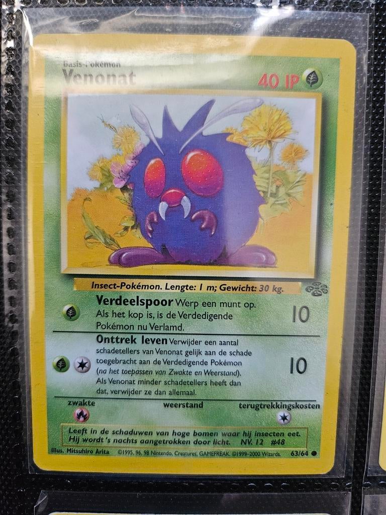 Pokemon Venonat 63/64 Jungle, Ophalen of Verzenden, Zo goed als nieuw, Losse kaart, Foil