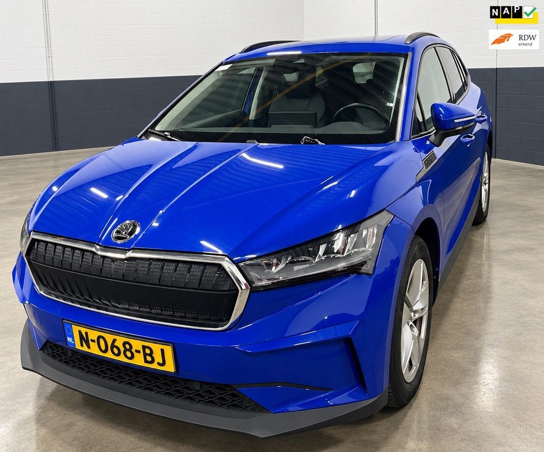 Skoda Enyaq iV 60|NAP|NL AUTO|ELECTRIC|PANO|1/2 Leder| 1e Ei, Auto's, Automaat, Achterwielaandrijving, Gebruikt, Verwarmde buitenspiegels