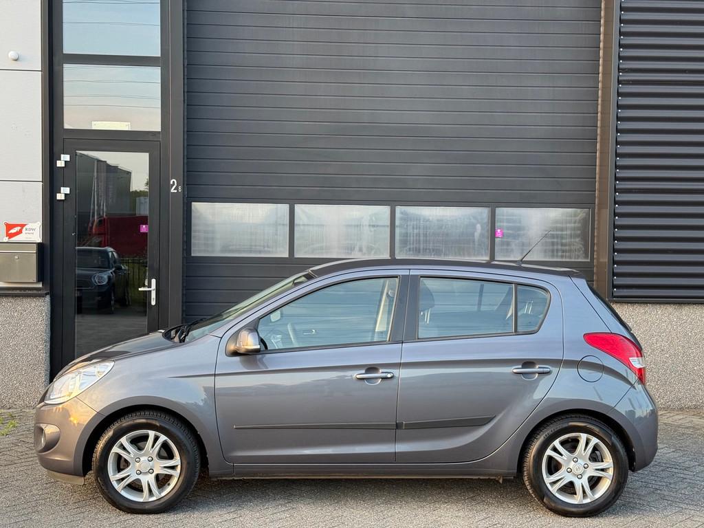 Hyundai I20 1.2i i-Motion Airco Navi, Auto's, Hyundai, Euro 5, Gebruikt, 31 €/maand, 4 cilinders