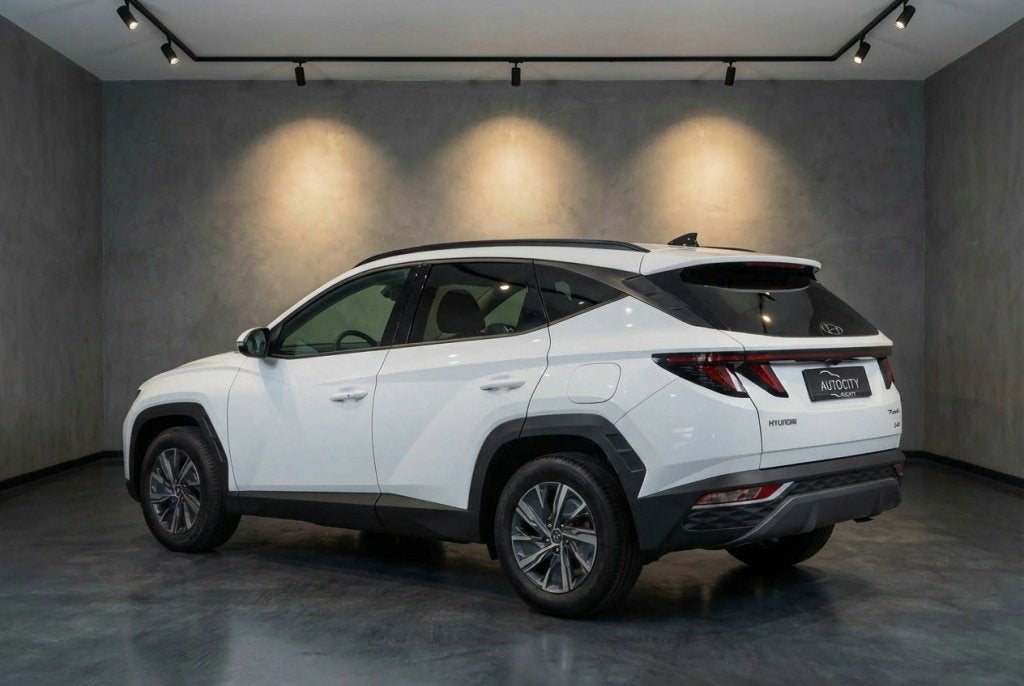 Hyundai Tucson 1.6 T-GDI HEV Comfort | Carplay | Camera | Ad, Auto's, Gebruikt, 4 cilinders, Wit, Bedrijf